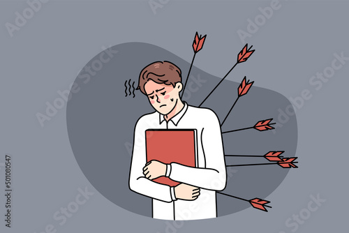 Unhappy male employee with arrows in back struggle with business betrayal. Upset stressed businessman betrayed by colleagues or coworkers. Rivalry and competition. Vector illustration. 