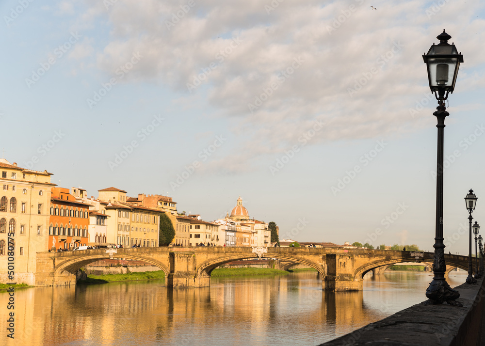 Ponte alle Grazie - bridge in Florence, Italy and Arno river 