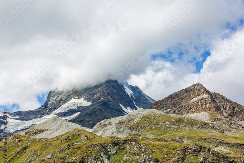 Panorama of cloud layer from mountain top over Swiss alps