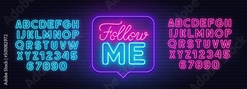 Follow me neon sign in the speech bubble on brick wall background.