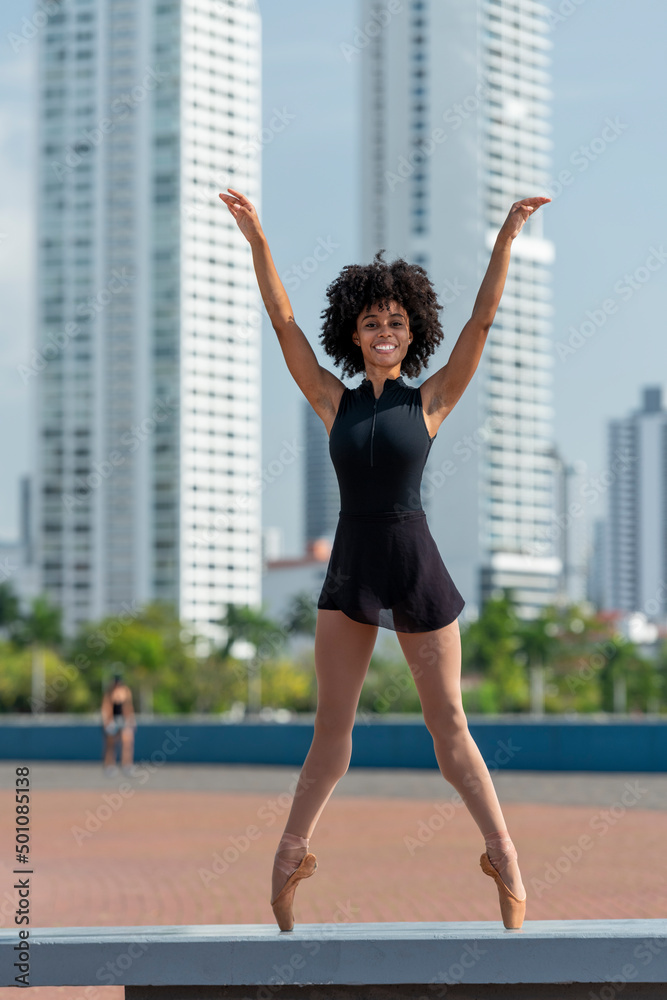 Front view of latin ballet dancer practicing on street in Panama city, Central America