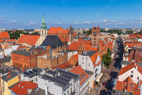 view of the old town of Torun and the Vistula river from above during a warm summer day.