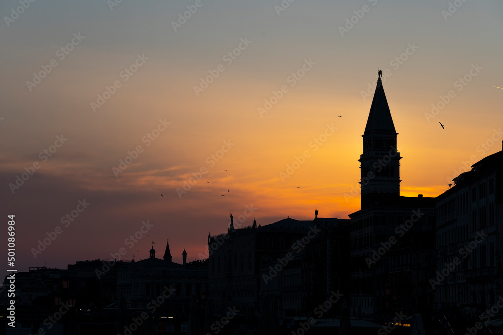 Silhouette of San Marco Bell Tower at sunset in Venice, Italy