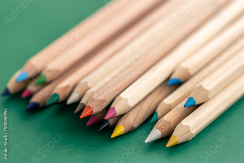 Close-up, multi-colored wooden pencils for drawing isolated.