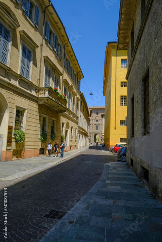 Parma, Italy: Old city streets on a sunny day and Palazzo Pilotta in the back of the street © Kate