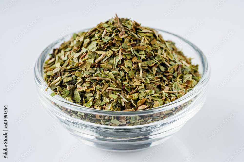 dried fragrant oregano marjoram on a white acrylic background dried fragrant oregano marjoram on a white acrylic background