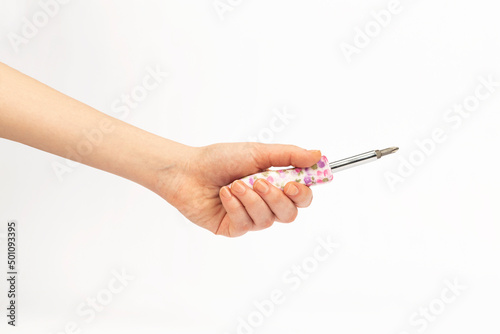 screwdriver in woman hand on white background