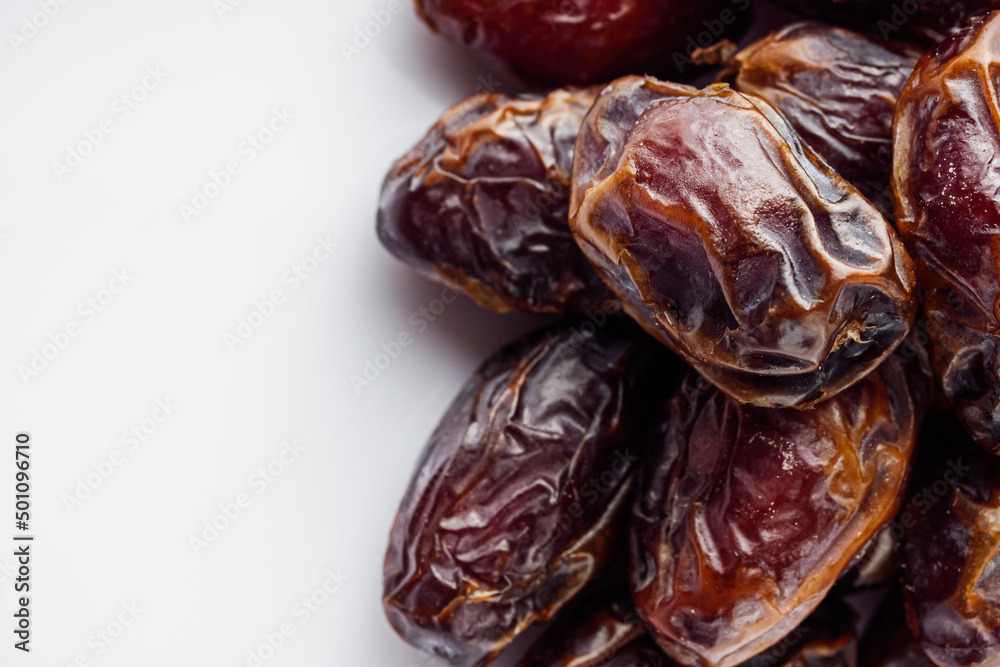 juicy royal dates on a white acrylic background juicy royal dates on a white acrylic background