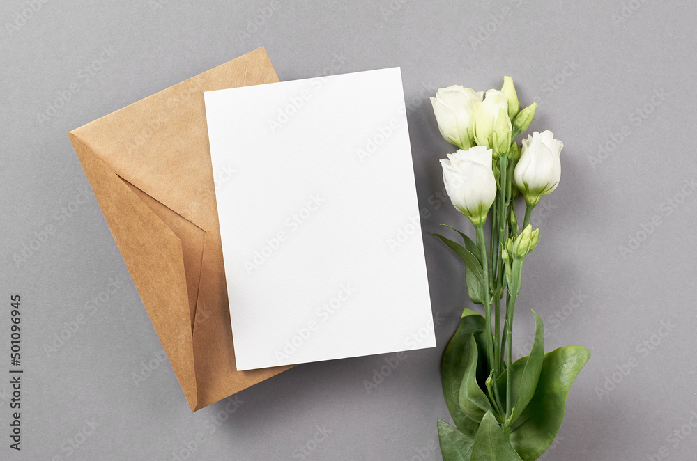 Wedding invitation card mockup with envelope and white eustoma flowers