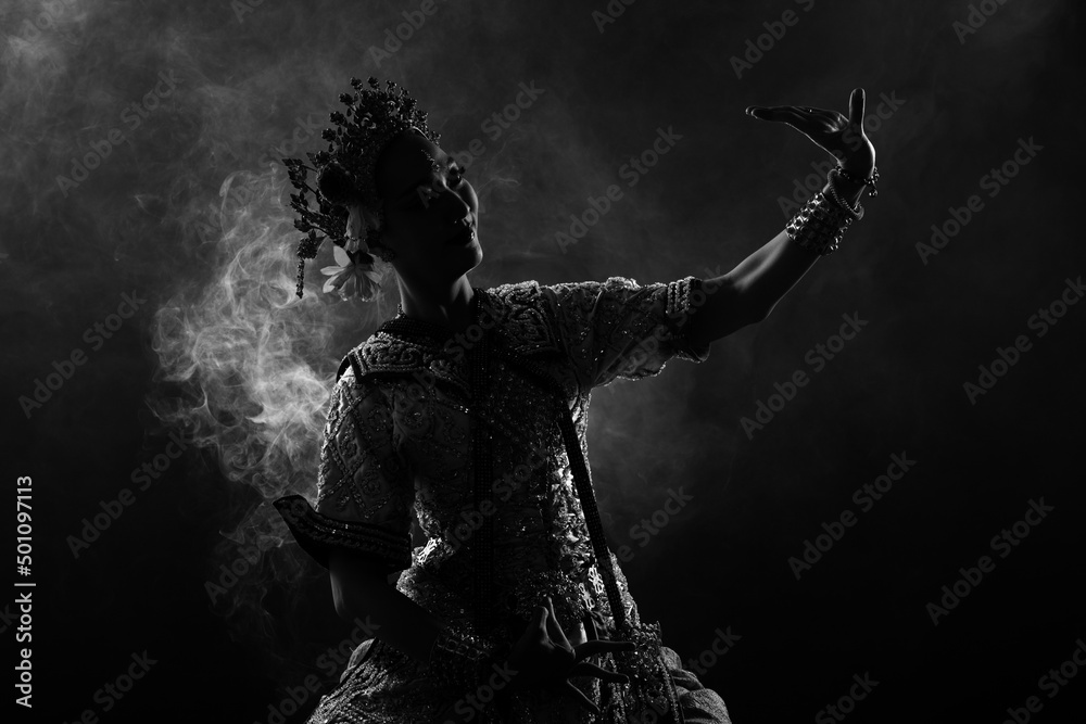 Half body of Asian Woman wear Thai Traditional Costume Dancer with beautiful design dress silhouette