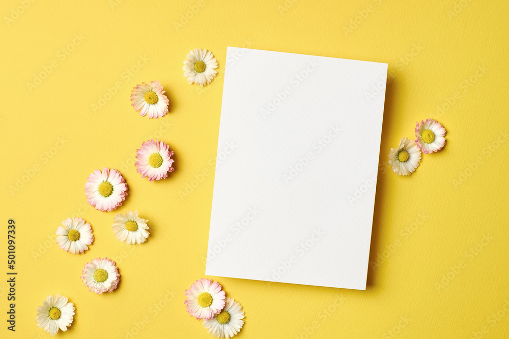 Invitation or greeting card mockup with daisy flowers Invitation or greeting card mockup with daisy flowers