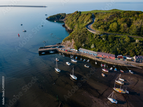View of  boats in Lower Fishguard Harbour in Pembrokeshire photo
