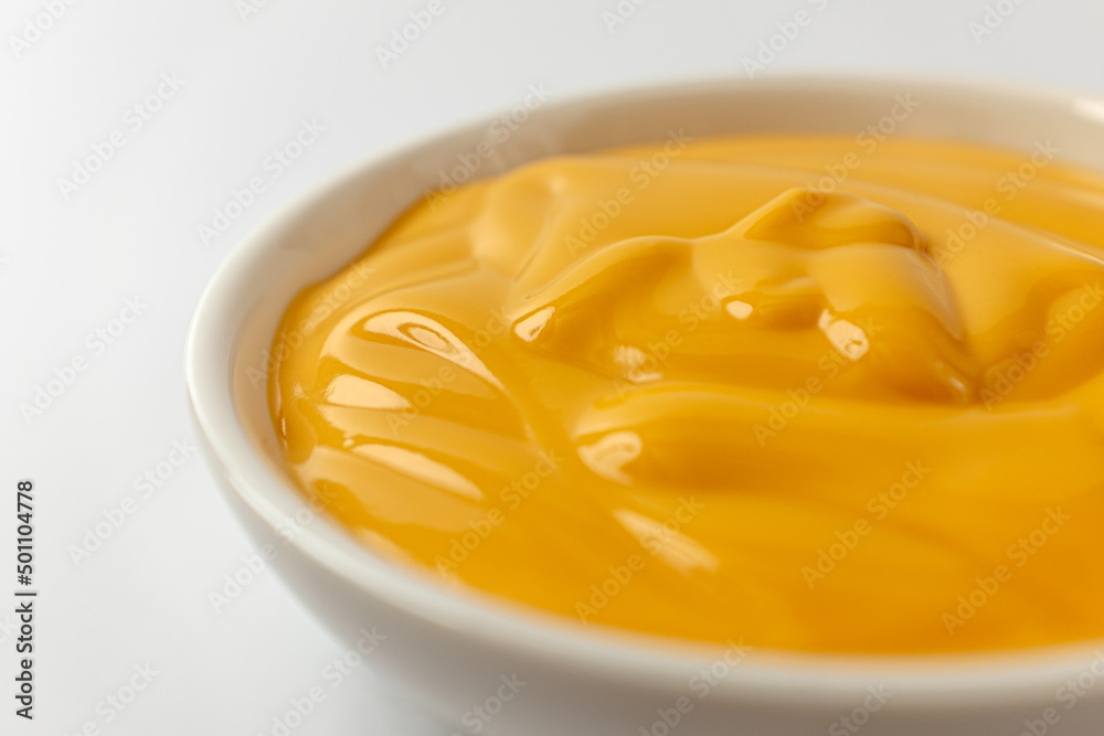 cheese sauce on a white background cheese sauce on a white background