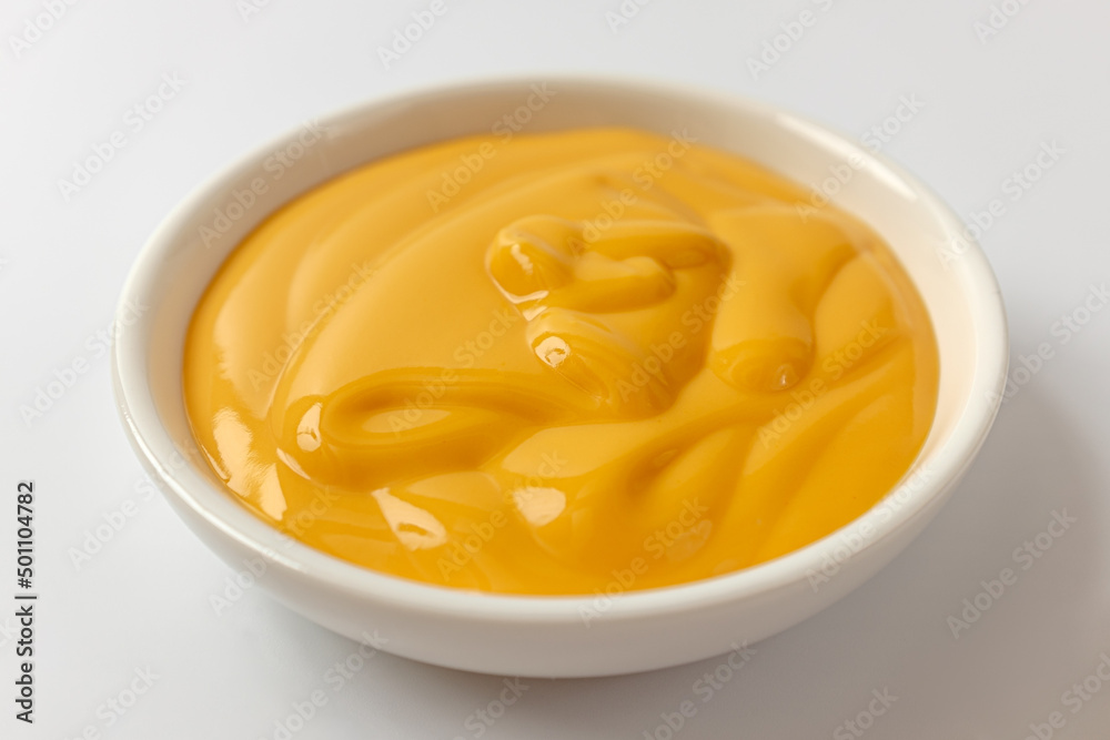 cheese sauce on a white background cheese sauce on a white background