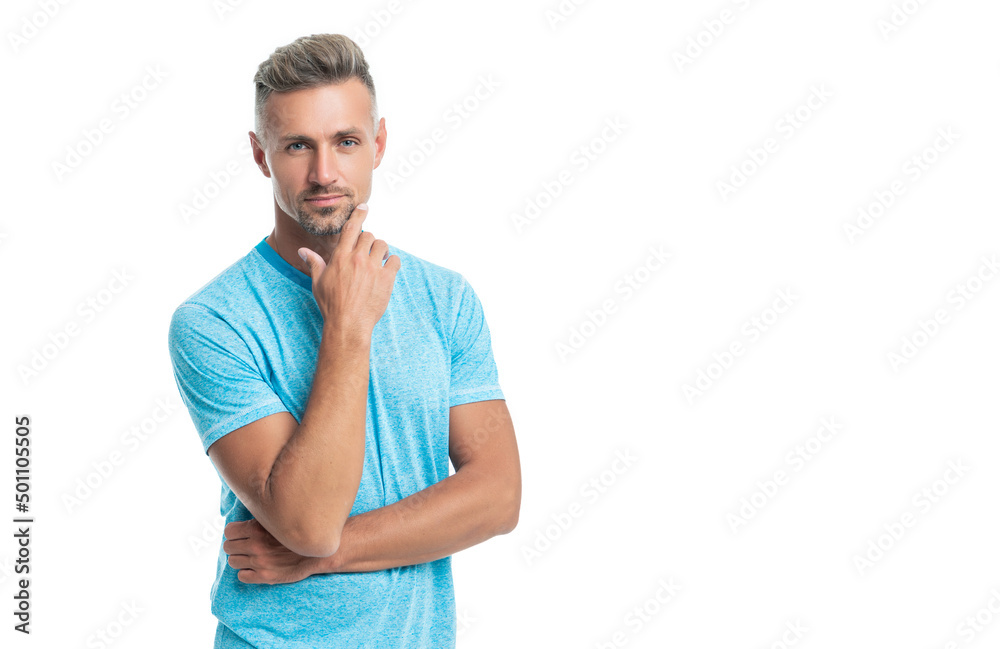 Serious caucasian middleaged man stroking chin in casual style isolated on white Serious caucasian middleaged man stroking chin in casual style isolated on white
