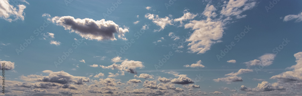Obraz premium Background of light blue sky with white clouds at the bottom