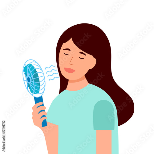 Woman holding portable fan blowing her face in flat design.