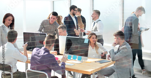 business people greet each other in the office