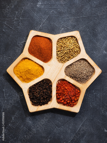 Spices, herbs, spicy and seasoning. in a wooden box top view. Spices background