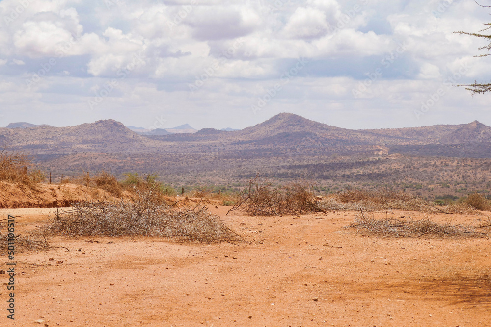 Scenic view of arid landscapes against sky at Nanyuki, Kenya Scenic view of arid landscapes against sky at Nanyuki, Kenya
