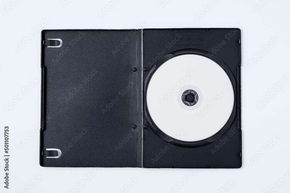 Naklejka premium White CD in black rectangular plastic box. White background.
