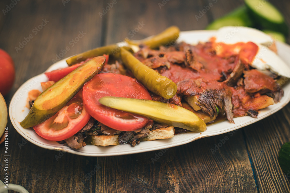turkish national food iskender or iskender kebab with yogurt and herbs turkish national food iskender or iskender kebab with yogurt and herbs