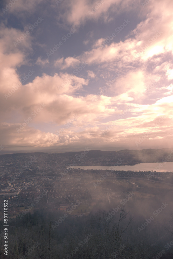 Fog over the lake, panoramic view of the city Fog over the lake, panoramic view of the city