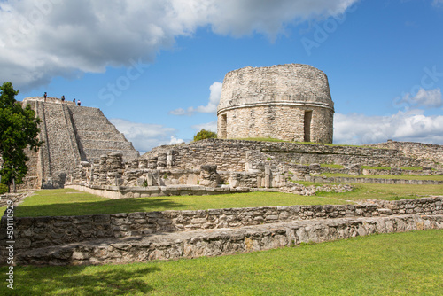 Round Temple in centre and Kukulcan Temple (Castillo), Mayan Ruins, Mayapan Archaeological Zone, Yucatan State, Mexico photo