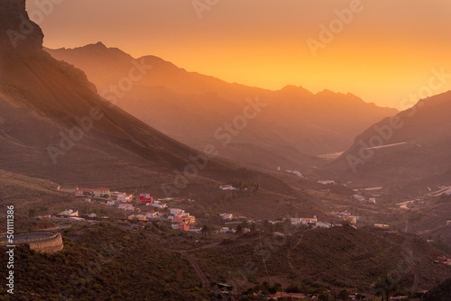 View of mountainous landscape during golden hour near Tasarte, Gran Canaria, Canary Islands photo