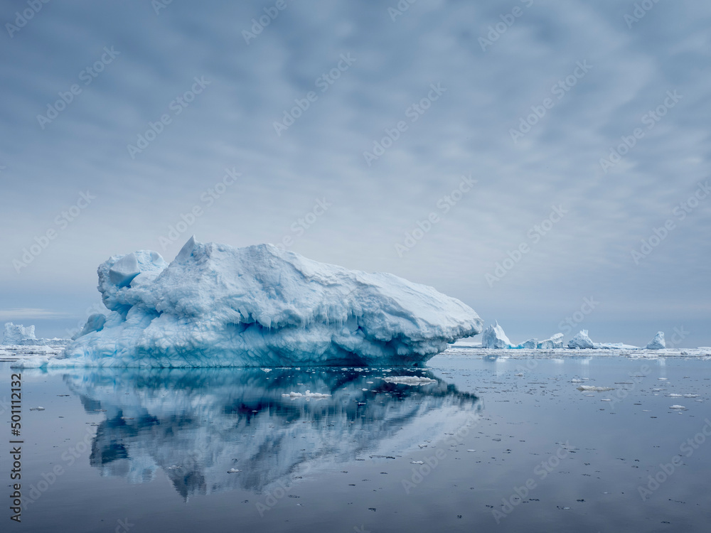 Large iceberg grounded on a reef at Peter I Island, Bellingshausen Sea Large iceberg grounded on a reef at Peter I Island, Bellingshausen Sea