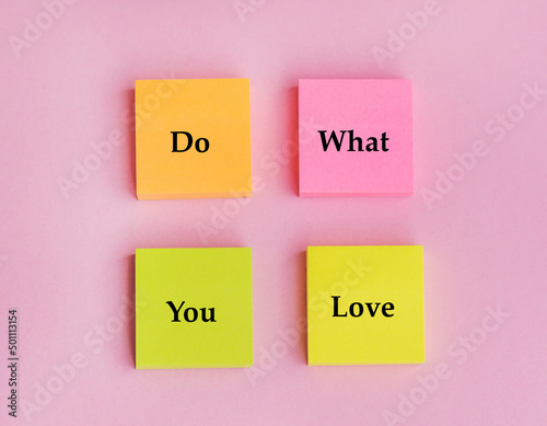 Do what you love text on sticky notes on pink background 