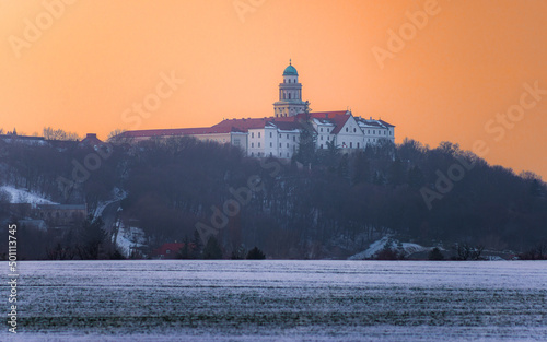 Pannonhalma Archabbey at the sunset time in the winter, Hungary