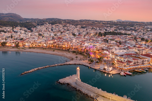 Aerial view of Venetian harbour and lighthouse at sunset, Rethymno, Crete island, Greek Islands photo