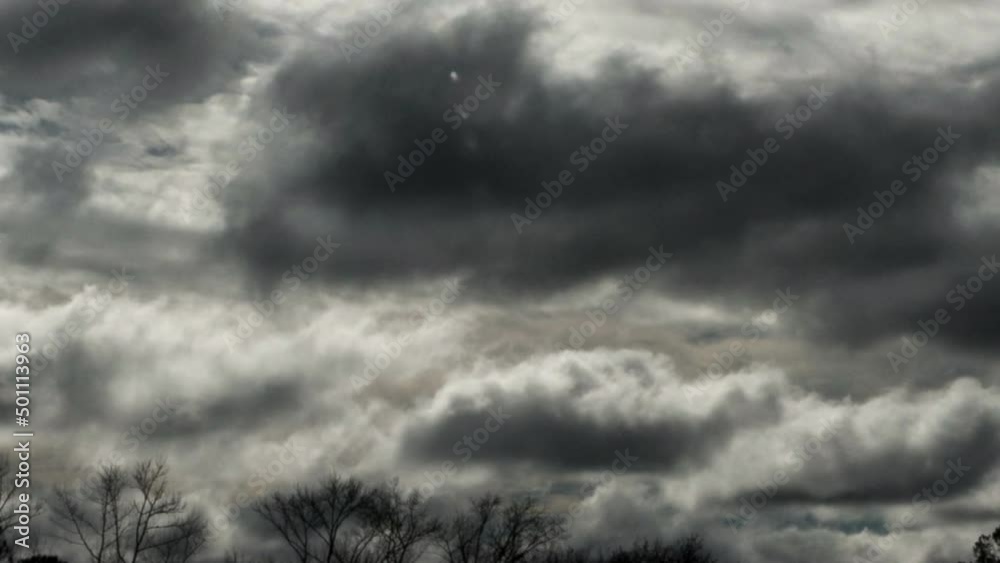 Light and dark clouds moving in sky, time lapse Light and dark clouds moving in sky, time lapse