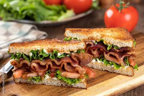 Bacon  lettuce and tomato sandwich cut in half