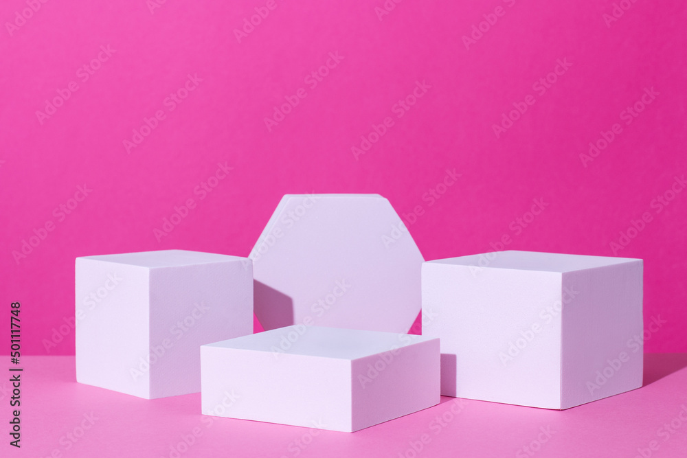 Empty podium or stand for product showcase on pink background Empty podium or stand for product showcase on pink background