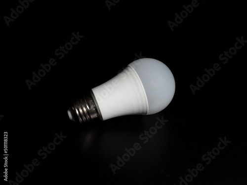 energy saving light bulb isolated on black