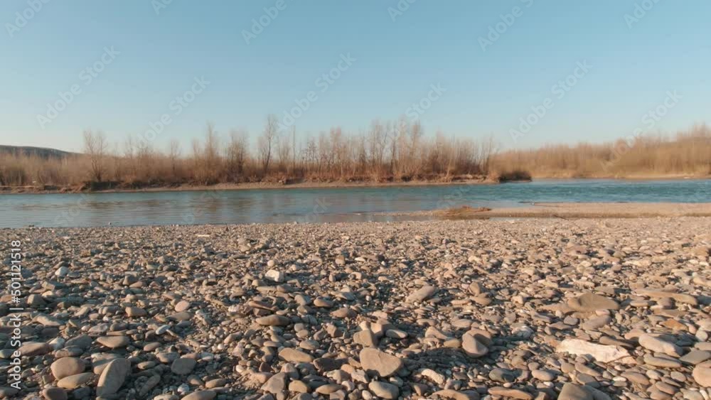 Rocky river bank camera movement Rocky river bank camera movement