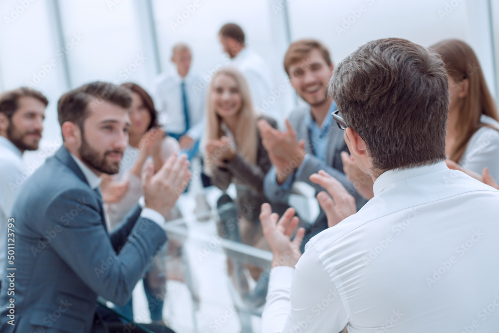 Obraz premium background image business people applauding in the conference room