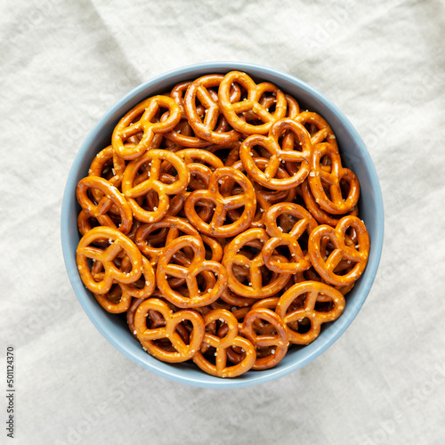 Crispy Salty Baked Pretzels in a Bowl, top view. Flat lay, overhead, from above.