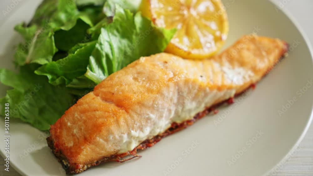 homemade fried salmon steak with lemon and vegetable - healthy food style homemade fried salmon steak with lemon and vegetable - healthy food style