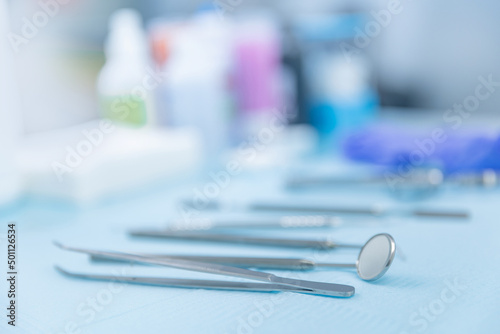 Dentist background  different tools for dental care  blue color