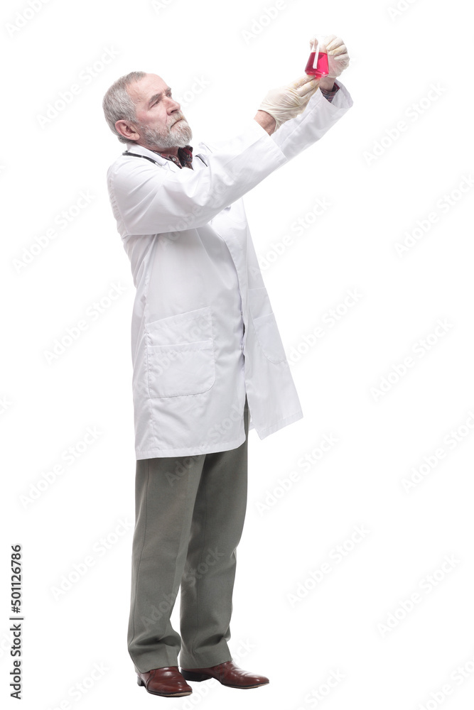 elderly competent doctor with a laboratory flask in his hands. elderly competent doctor with a laboratory flask in his hands.