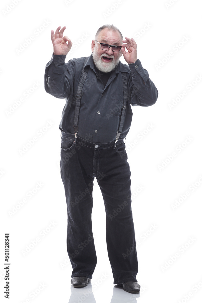 casual elderly man looking carefully through glasses. casual elderly man looking carefully through glasses.