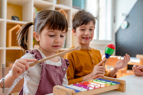 Kindergarten Children Learning Music Using Various Colorful  Instruments. Learning Music for Kids using Colors. Montessori Music Activities for Preschoolers.
