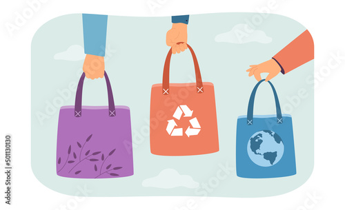 Hands holding eco cloth bags with recycle sign and globe. People shopping in supermarket or store flat vector illustration. Green lifestyle concept for banner, website design or landing web page