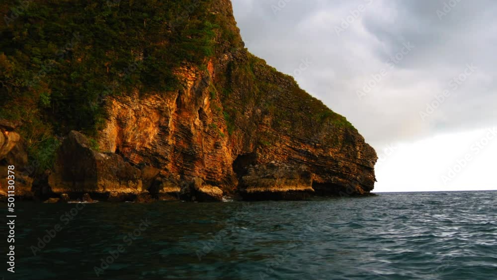 Point Of View From Boat Green Plants On Natural Mountains Against Cloudy Sky - Koh Phi Phi, Thailand Point Of View From Boat Green Plants On Natural Mountains Against Cloudy Sky - Koh Phi Phi, Thailand