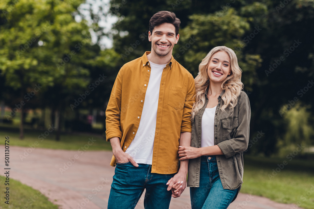 Portrait of attractive careful cheerful couple life partners meeting on fresh air spending daydream time outdoors Portrait of attractive careful cheerful couple life partners meeting on fresh air spending daydream time outdoors