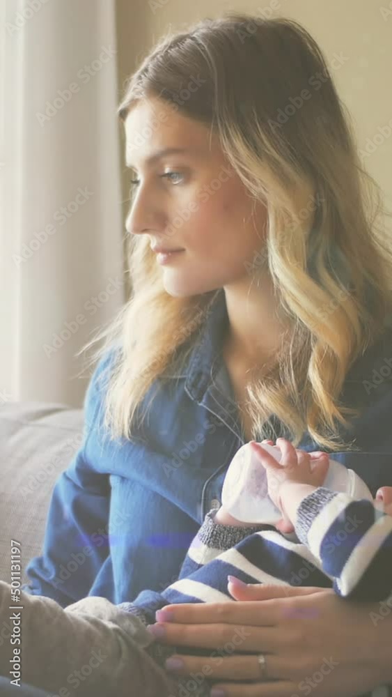 Animation of glowing spots over caucasian mother with baby with drinking milk Animation of glowing spots over caucasian mother with baby with drinking milk