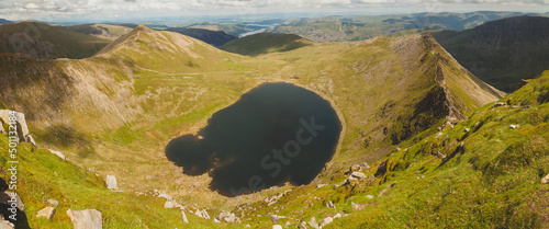 Obraz na plátně Natural panoramic landscape from Helvellyn Edge, and the small lake Red Tarn, in